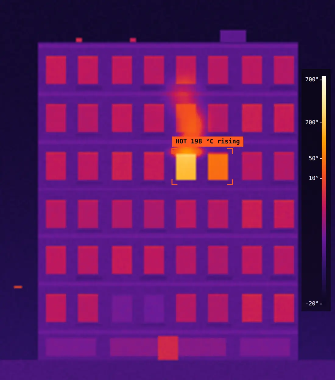 Simulation: the same building in thermal. One window, four floors up, glows far hotter than every other, and it is marked.